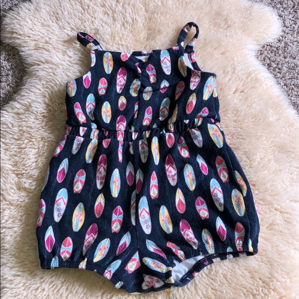 Girl’s surfboard romper
